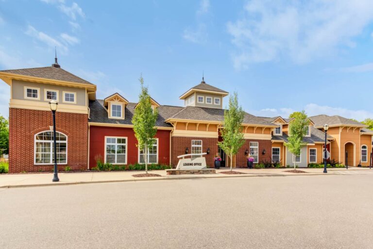 City Walk at Woodbury Apartments exterior leasing office.